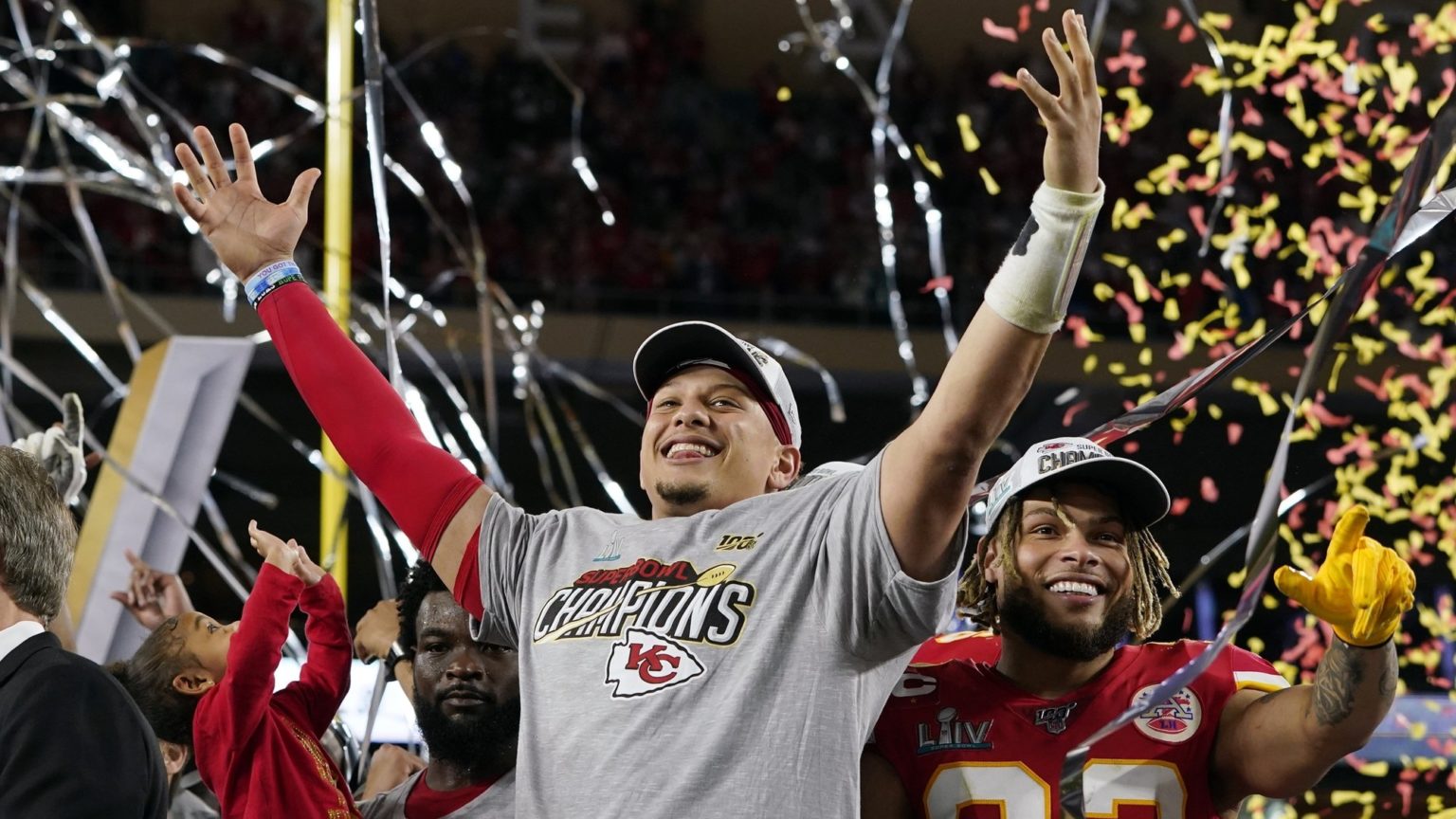 Kansas City Chiefs quarterback Patrick Mahomes, left, and Tyrann ...